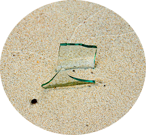 Glass shard in the sand